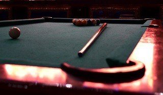 Professional pool table setup in Holly Springs content img2